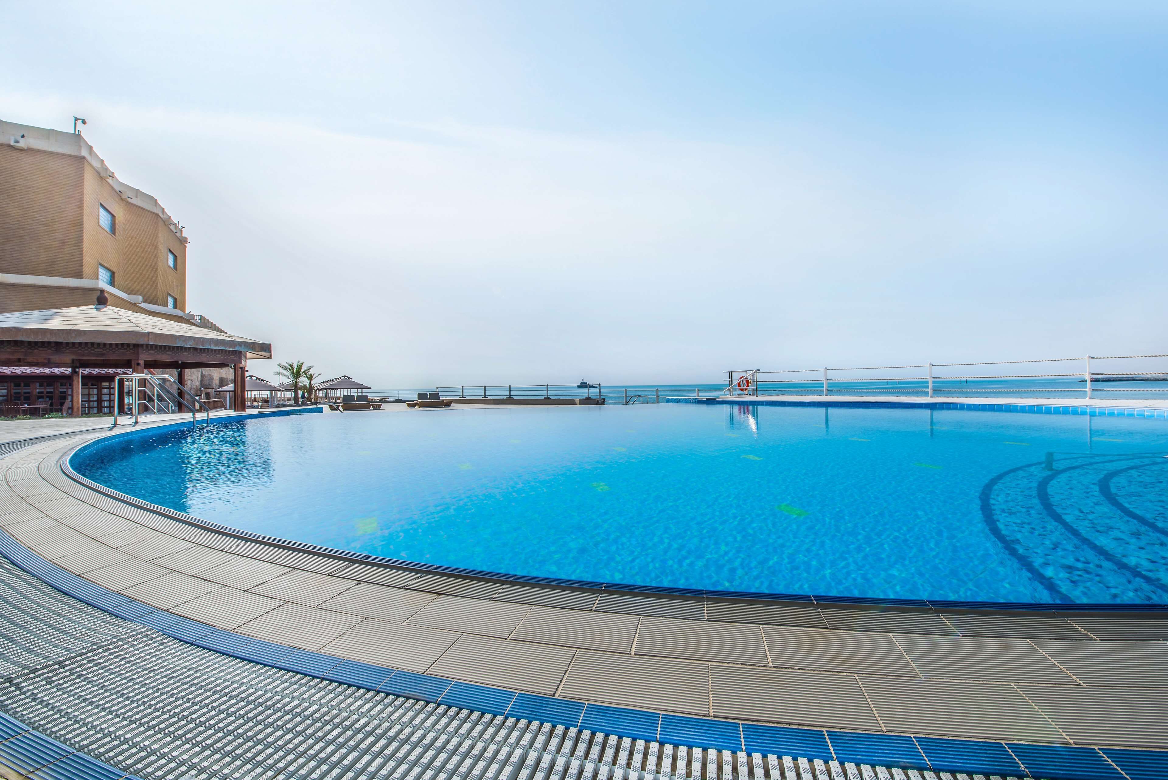 indoor pool, 2 outdoor pools, pool umbrellas, pool loungers