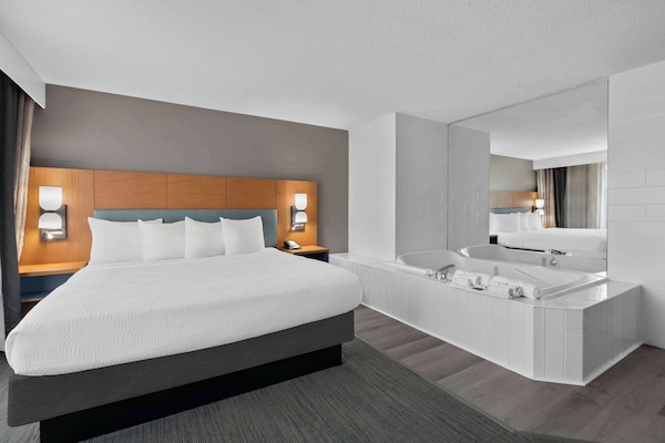 Suite, 1 Bedroom, Non Smoking, Jetted Tub | In-room safe, desk, laptop workspace, iron/ironing board