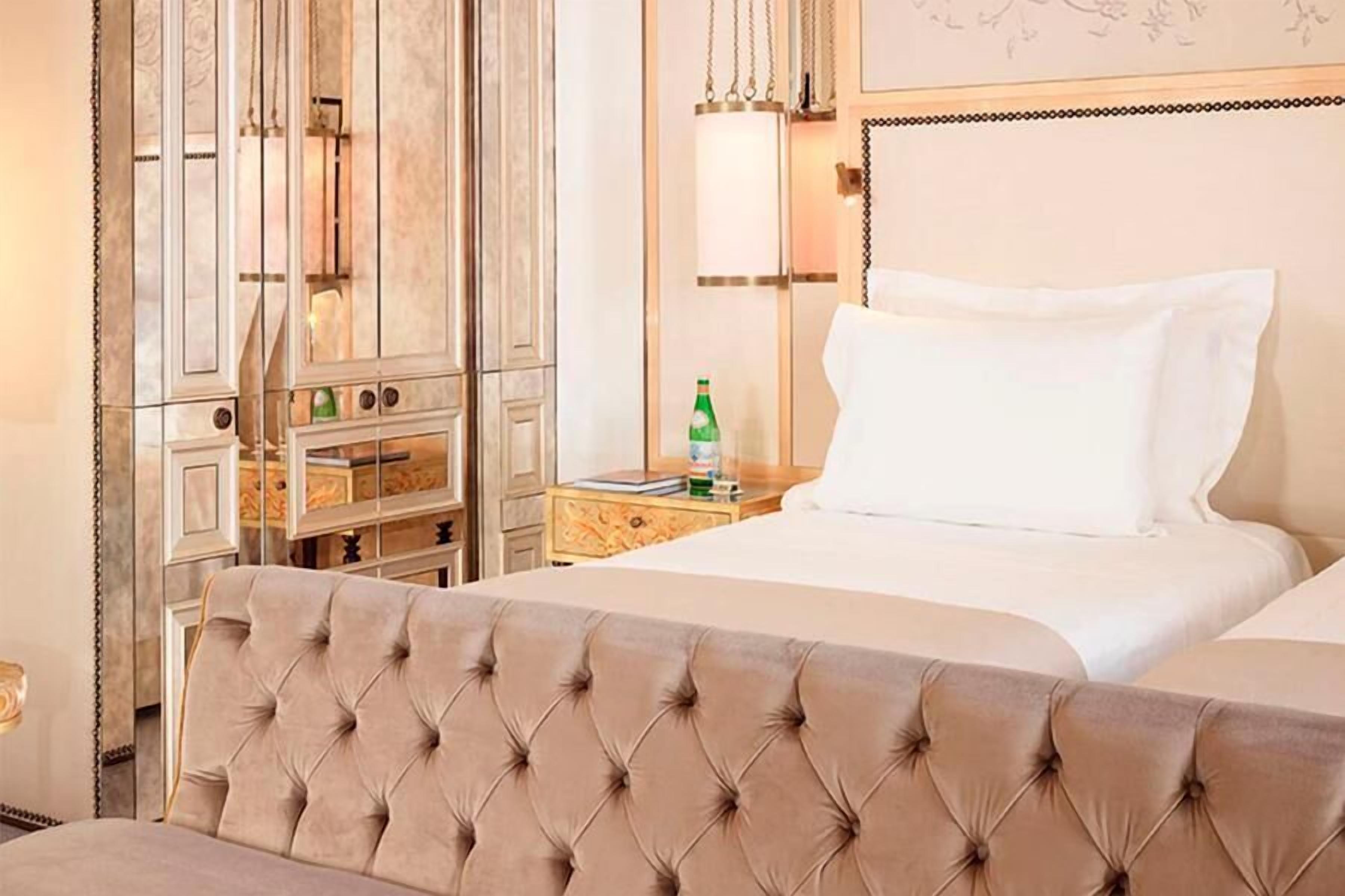 Premium bedding, pillow-top beds, minibar, in-room safe