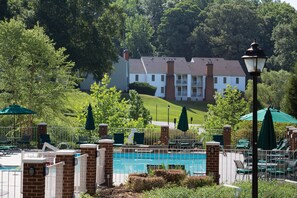 Outdoor pool, open 9:00 AM to 10:00 PM, pool umbrellas, sun loungers