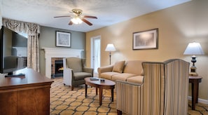 Deluxe Suite, 1 Bedroom, Kitchen (Fireplace & Balcony) | Living room | 42-inch TV with cable channels, DVD player