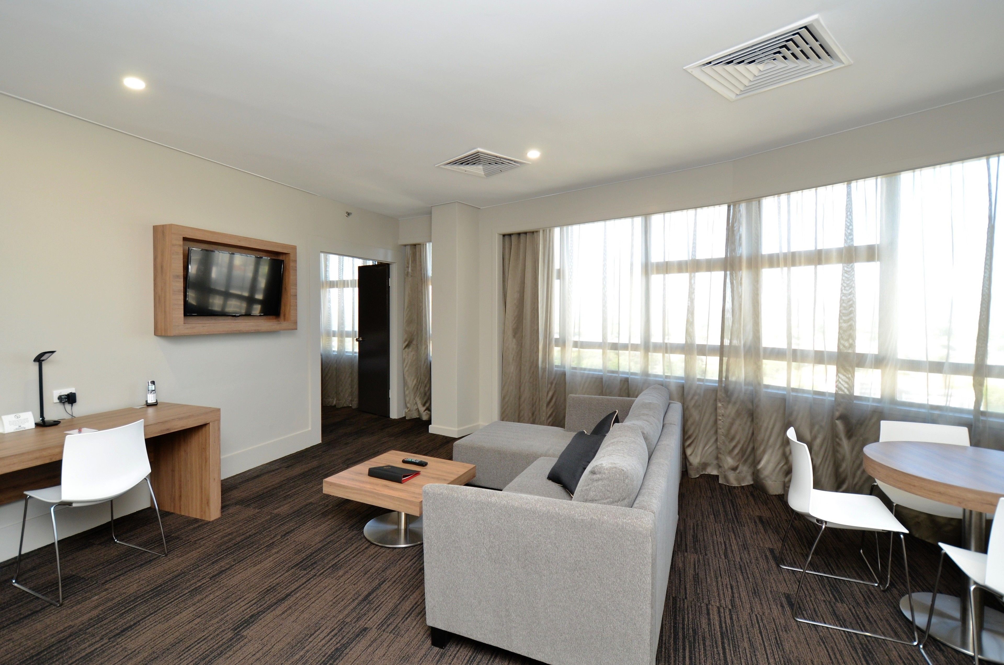 executive suite | living area | 55-inch lcd tv with digital channels, tv