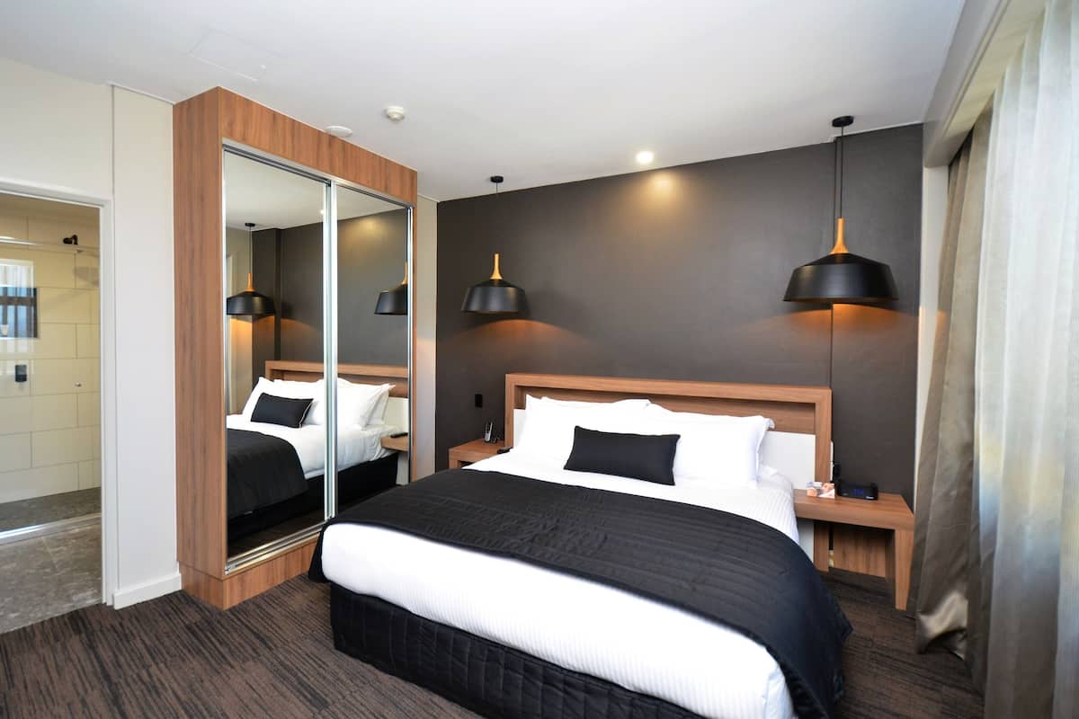 executive suite | in-room safe, desk, laptop workspace, blackout curtains