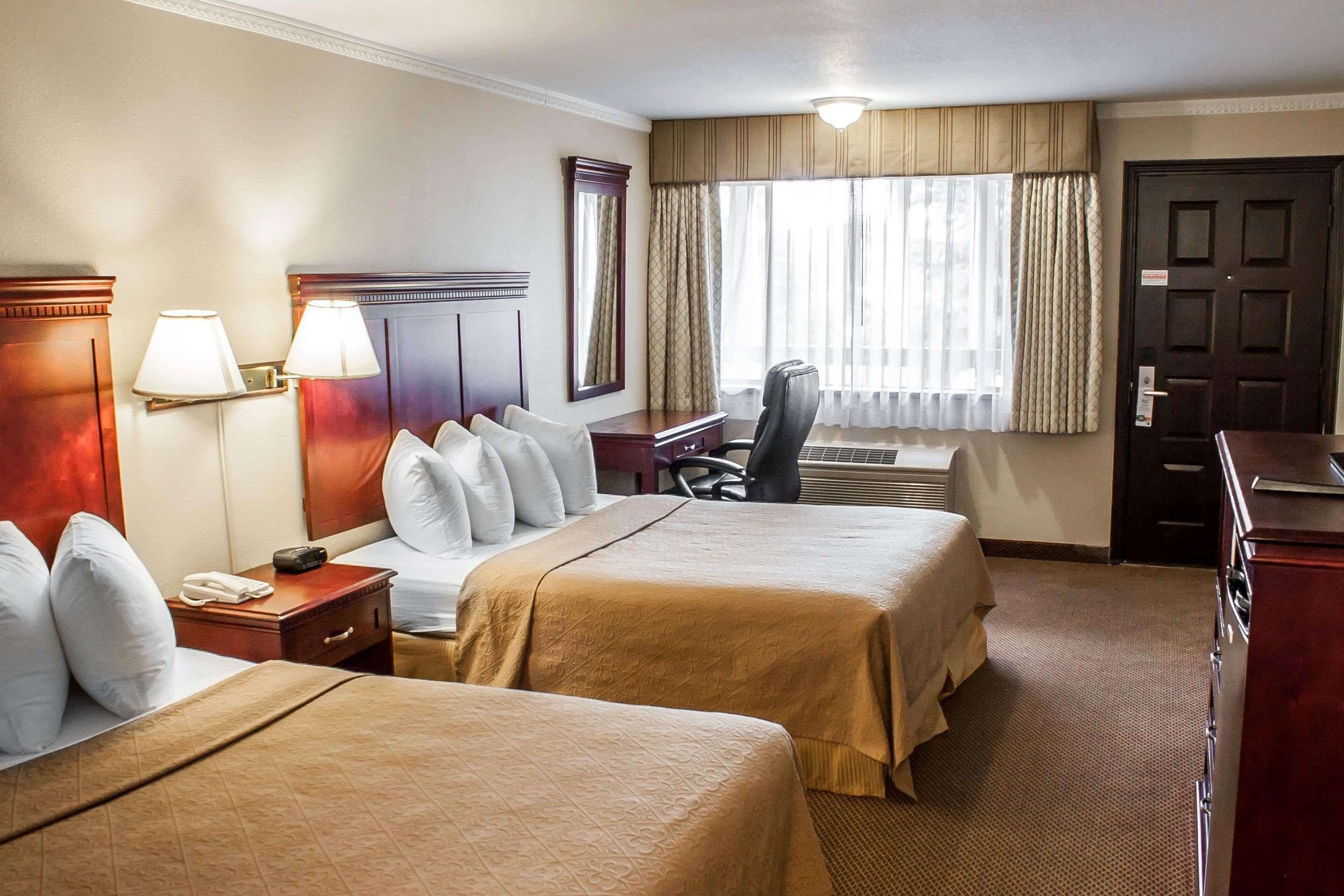 Premium bedding, desk, blackout drapes, soundproofing