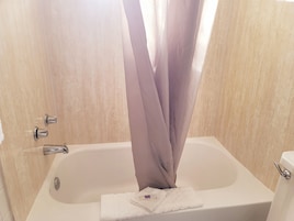 Combined shower/tub, free toiletries, towels, soap