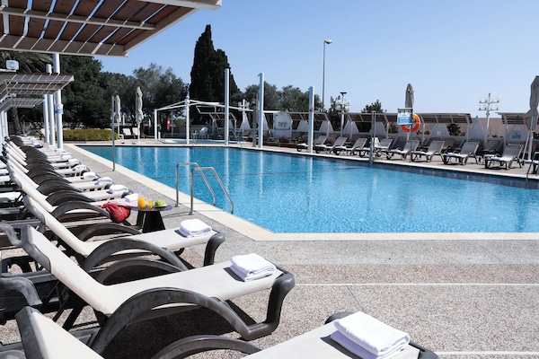 Seasonal outdoor pool, pool umbrellas