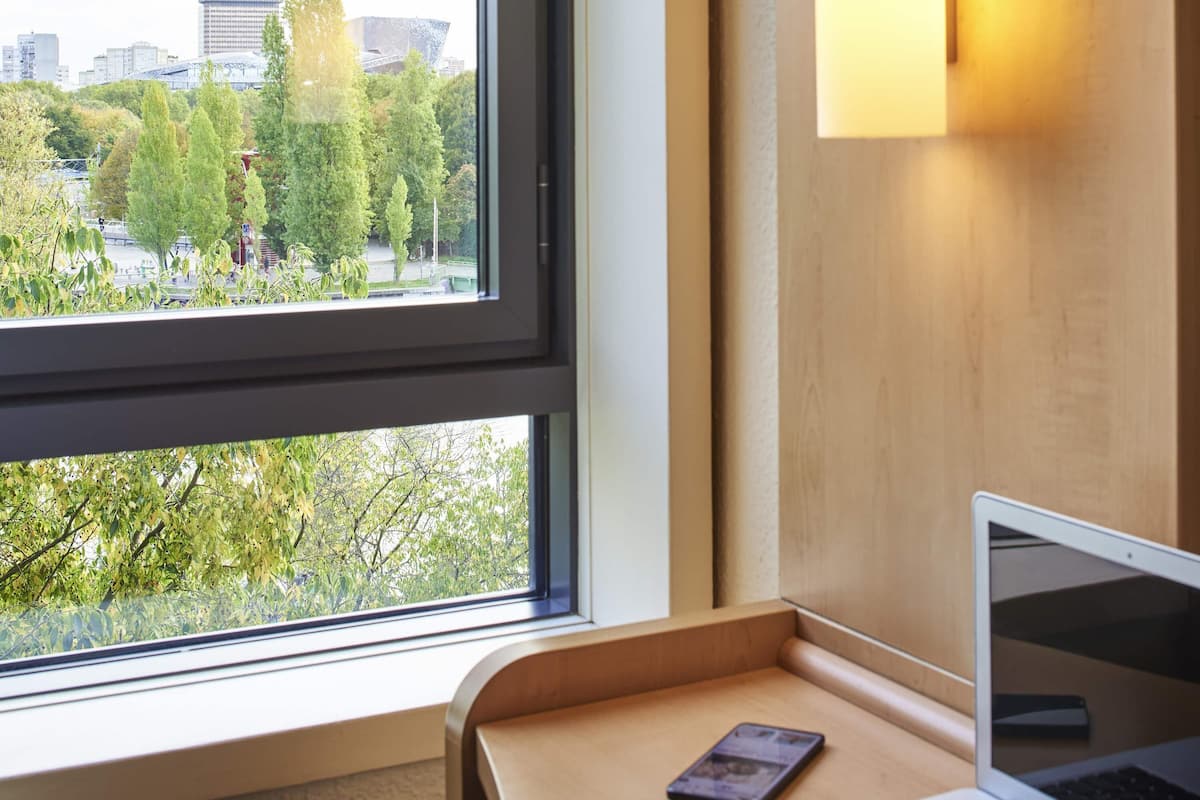 Desk, blackout drapes, soundproofing, iron/ironing board