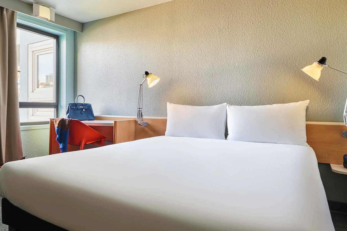 Desk, blackout curtains, soundproofing, iron/ironing board