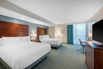 Premium bedding, pillowtop beds, in-room safe, individually furnished at Holiday Inn Orlando - Disney Springs® Area by IHG