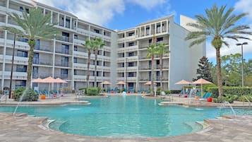 Outdoor pool, pool umbrellas, sun loungers