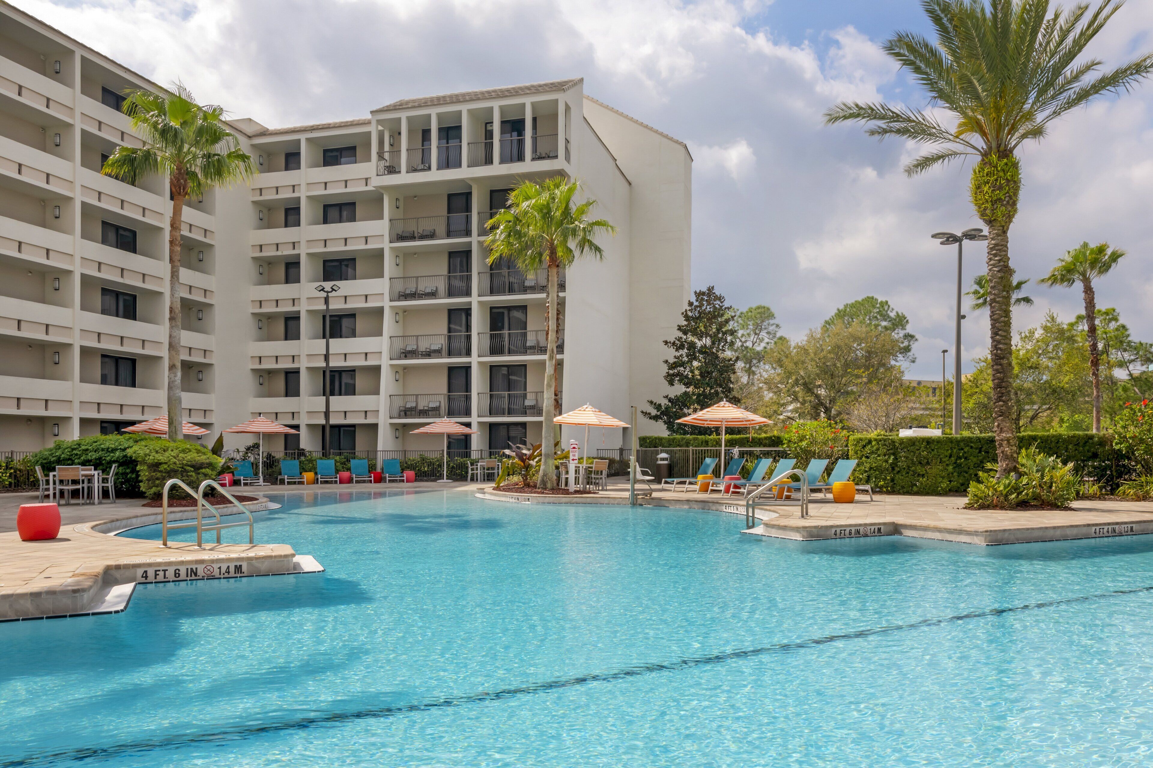 outdoor pool, pool umbrellas, pool loungers