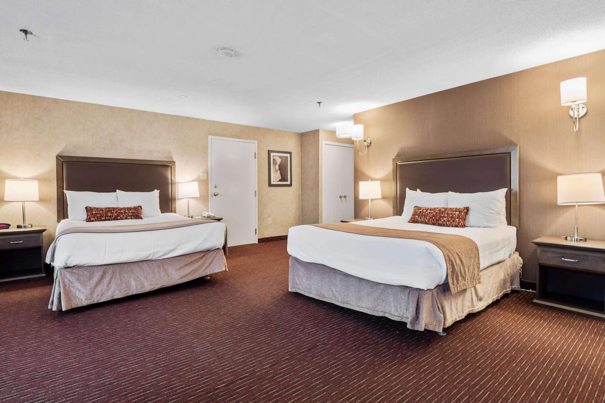 Standard Room, 2 Queen Beds, Non Smoking (Oversized Room) | Blackout drapes, iron/ironing board, free cribs/infant beds