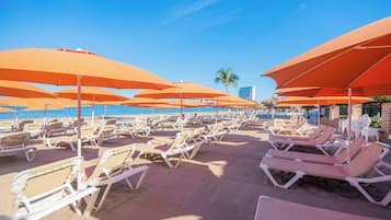 Free beach shuttle, sun loungers, beach umbrellas