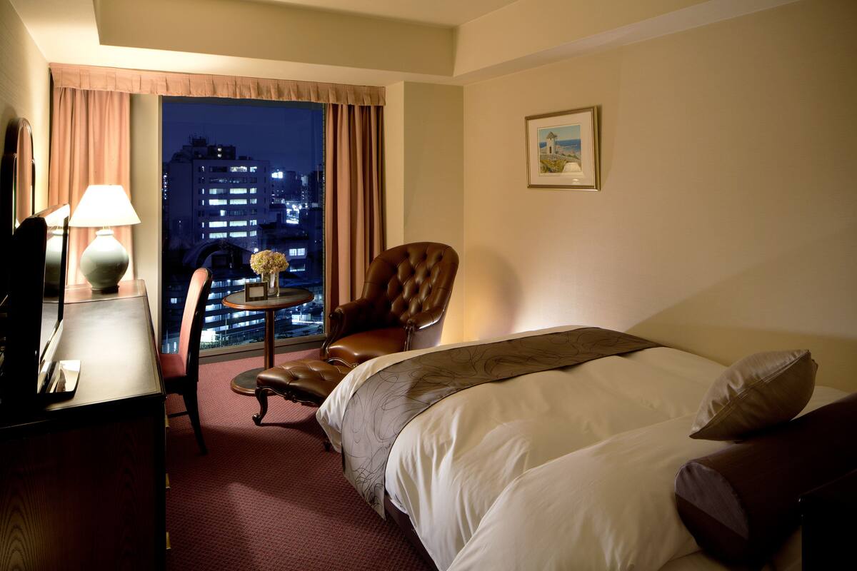 Down duvets, desk, blackout curtains, iron/ironing board (on request)