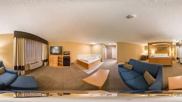 Suite, 1 trÚs grand lit, non-fumeurs | Coffres-forts dans les chambres, bureau, chambres insonorisées