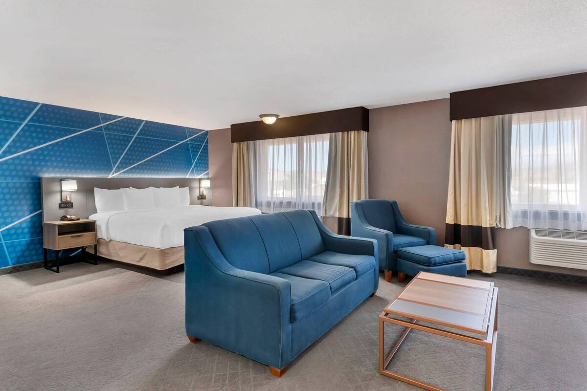 Suite, 1 King Bed, Non Smoking | In-room safe, desk, soundproofing, iron/ironing board (on request)