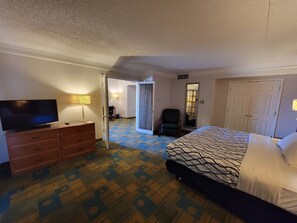 Suite, 1 King Bed, Non Smoking | Premium bedding, desk, soundproofing, iron/ironing board