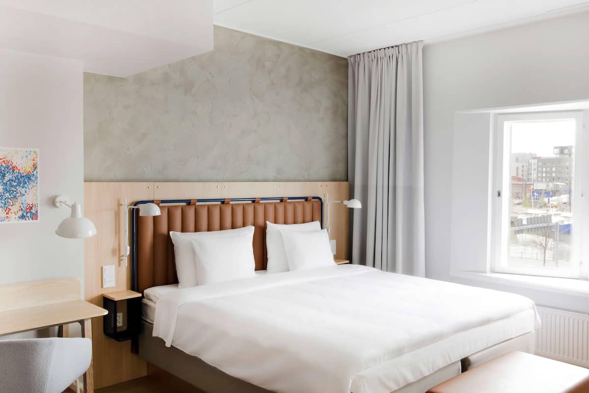 Premium bedding, down duvets, memory-foam beds, minibar