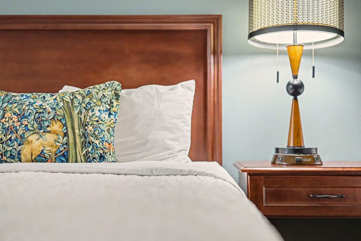Premium bedding, blackout curtains, soundproofing, iron/ironing board