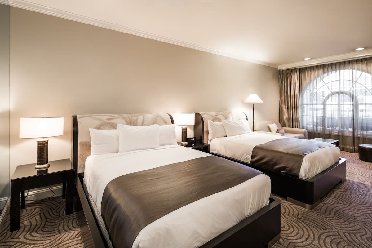 Luxury Two Queens Studio | 1 bedroom, premium bedding, in-room safe, individually decorated