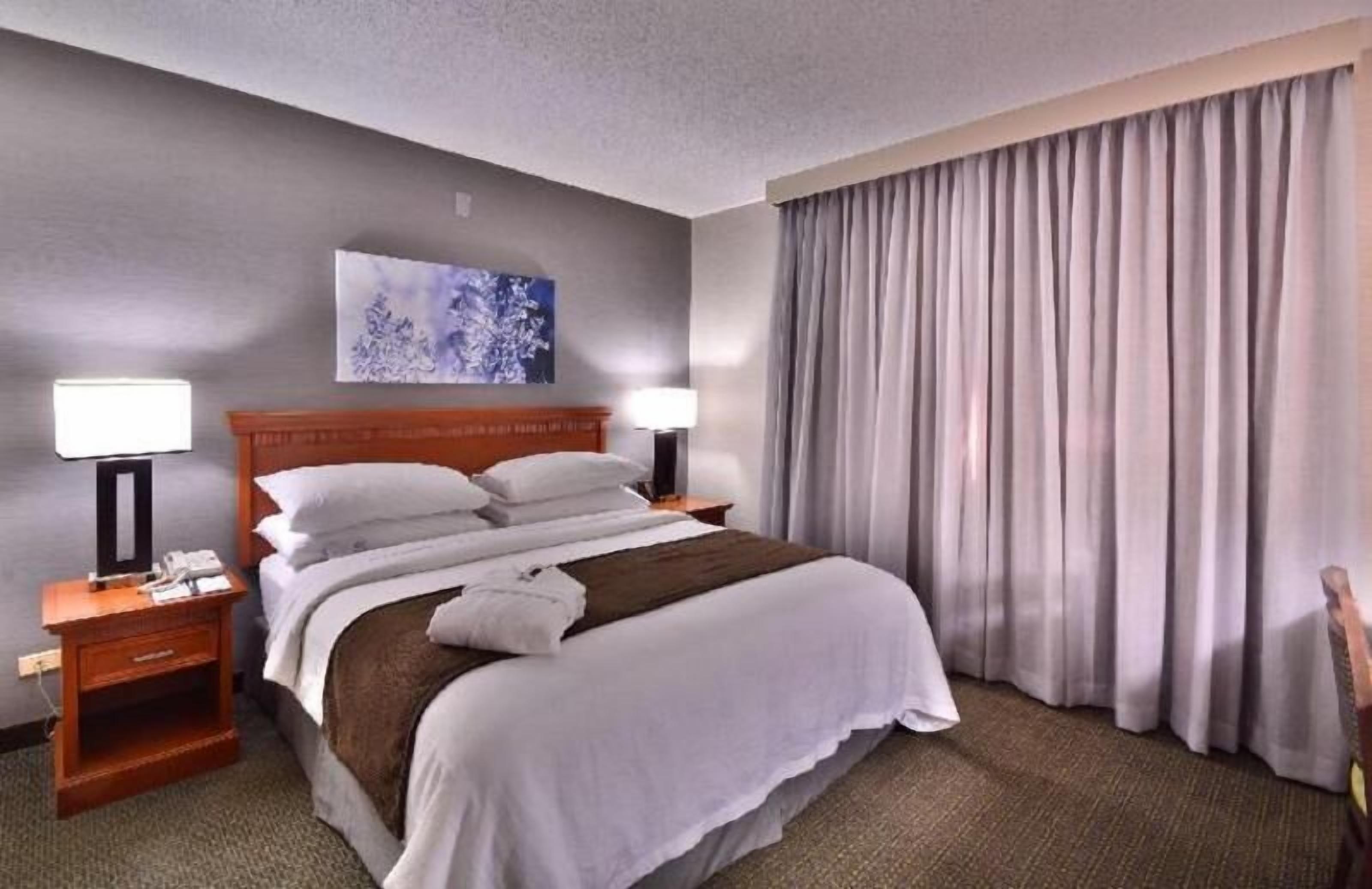 Premium bedding, pillow-top beds, in-room safe, cots/infant beds