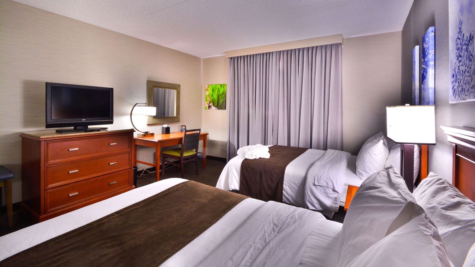 Premium bedding, pillow-top beds, in-room safe, cots/infant beds