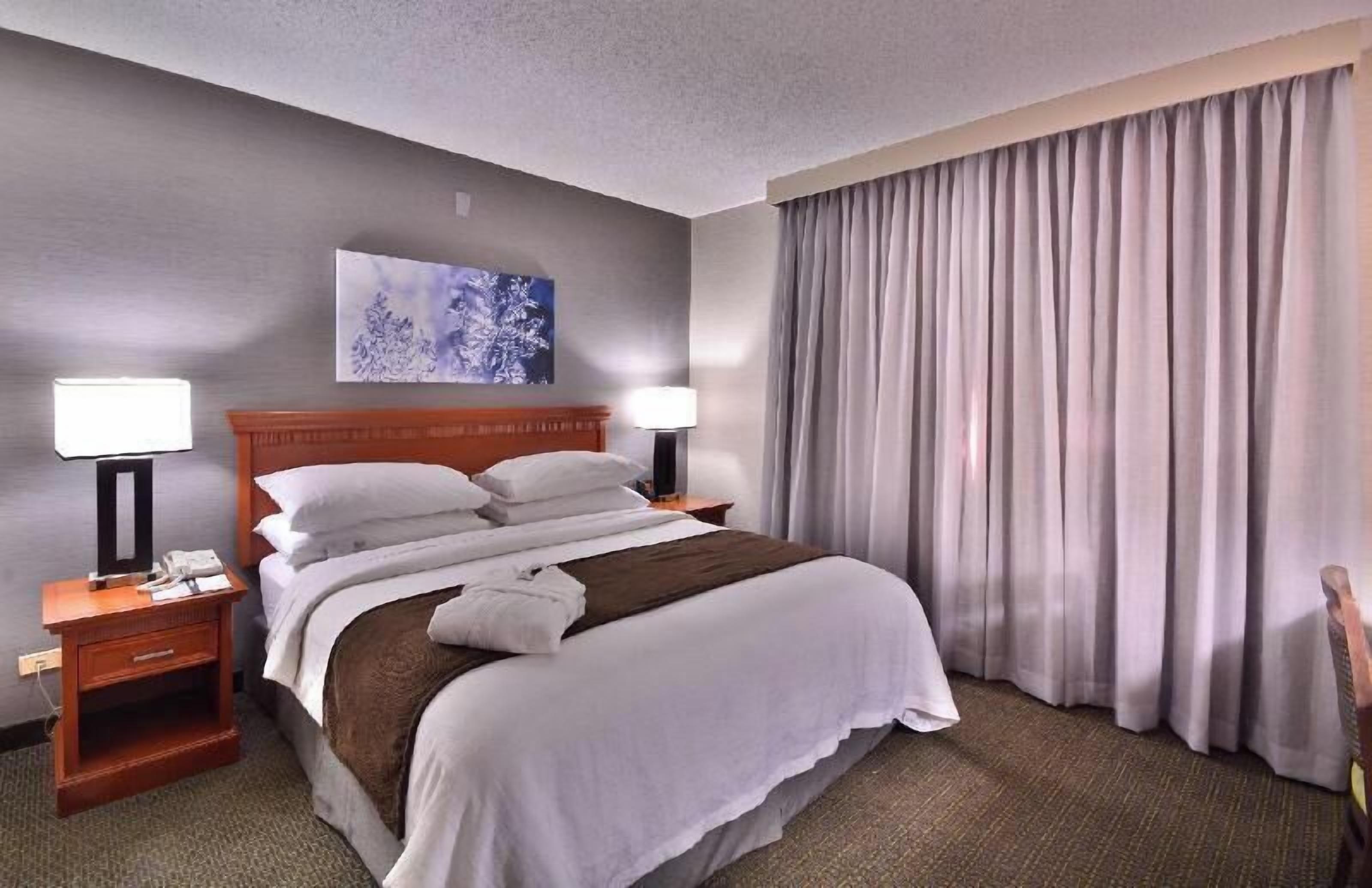 Premium bedding, pillow-top beds, in-room safe, cots/infant beds