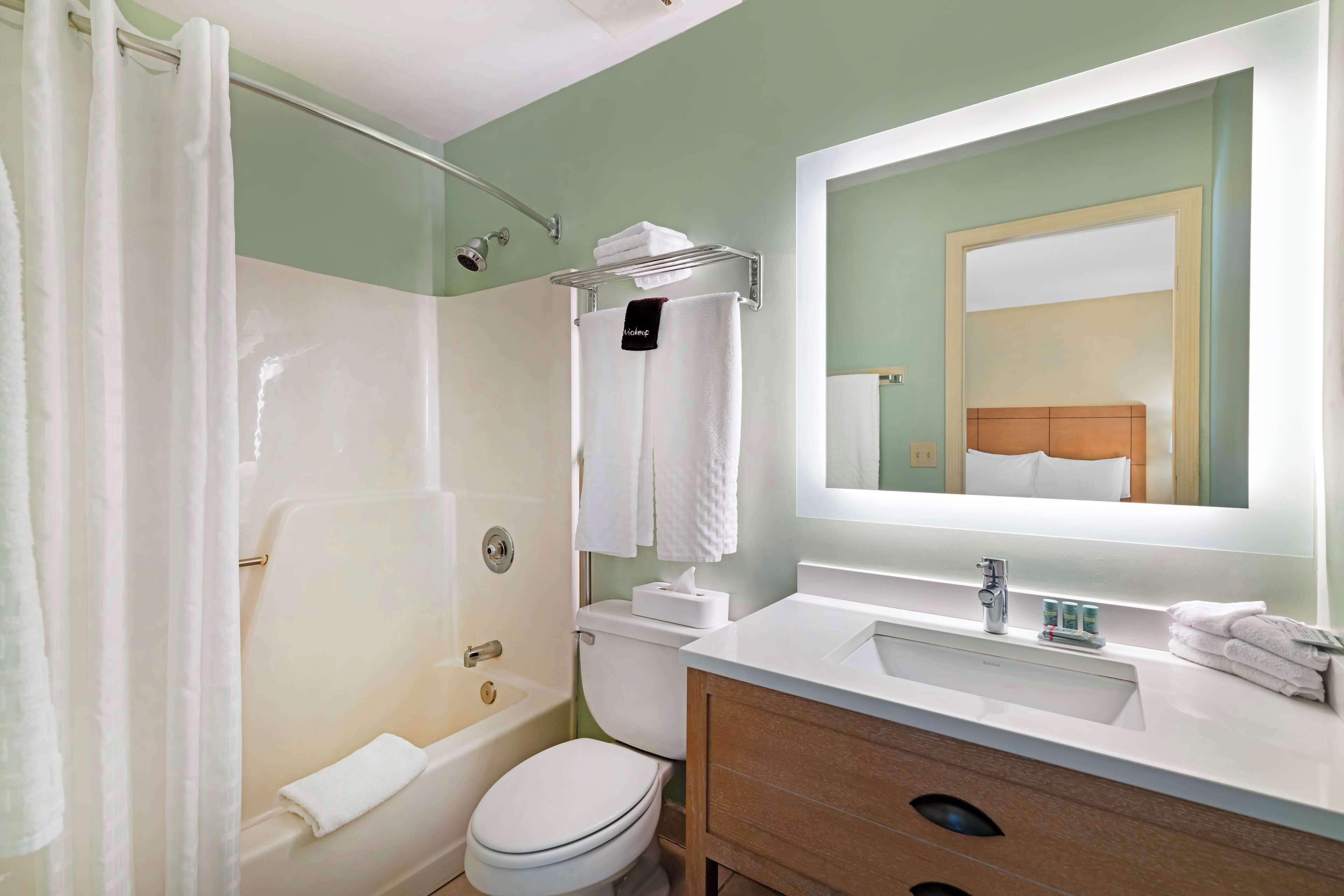 standard room, 2 double beds, non smoking, refrigerator & microwave | bathroom | combined shower/bathtub, free toiletries, hair dryer, towels