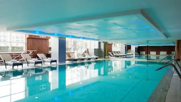 Indoor pool, open 8:00 AM to 8:00 PM, pool loungers