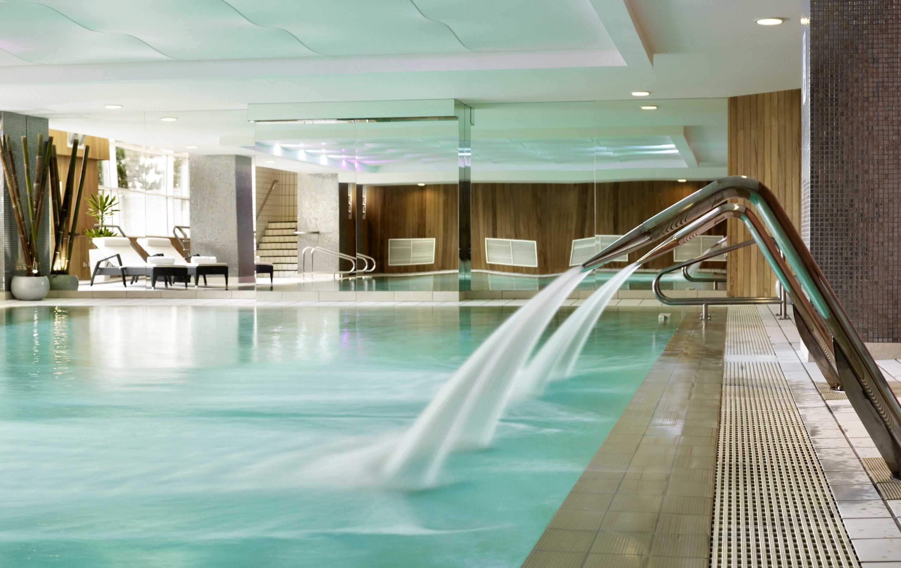 Indoor pool, open 8:00 AM to 8:00 PM, pool loungers