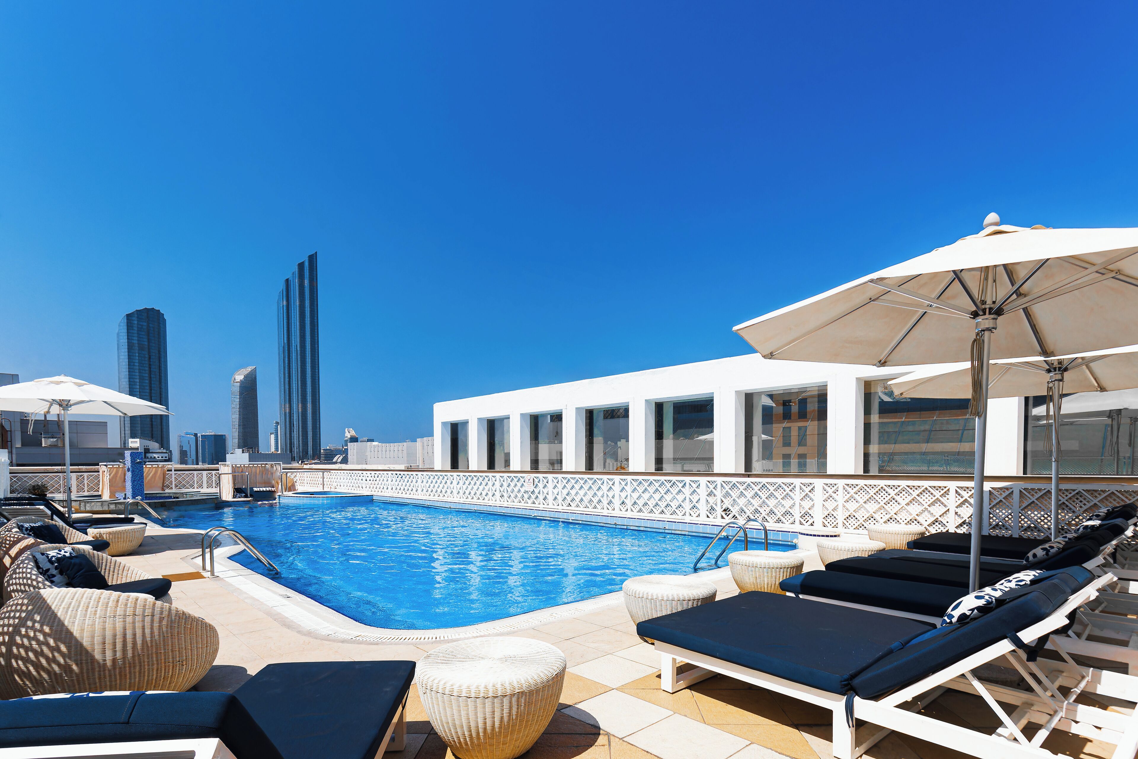 Outdoor pool, pool umbrellas, pool loungers