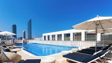 Outdoor pool, pool umbrellas, pool loungers