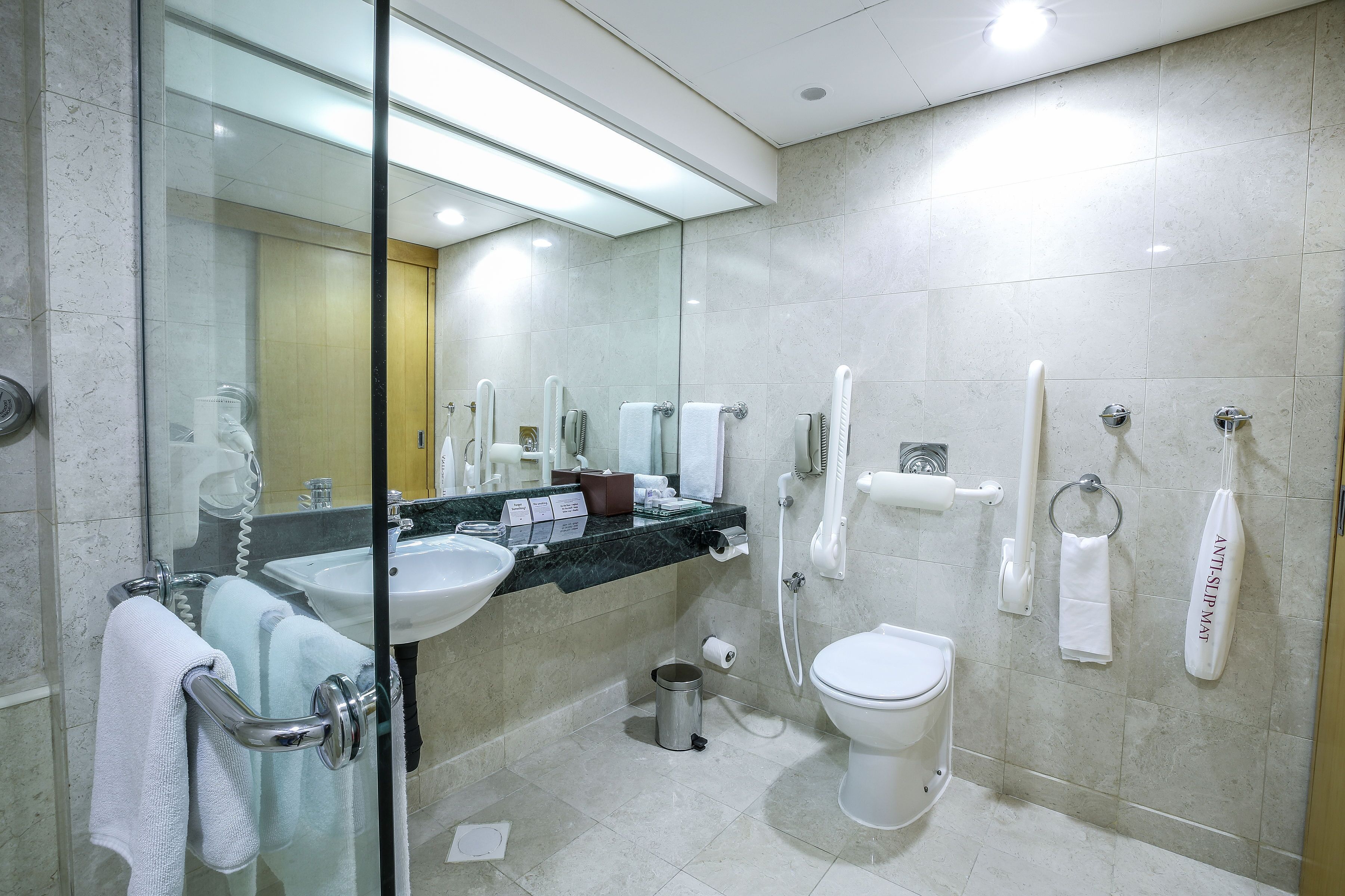 deep-soaking bathtub, rainfall showerhead, eco-friendly toiletries