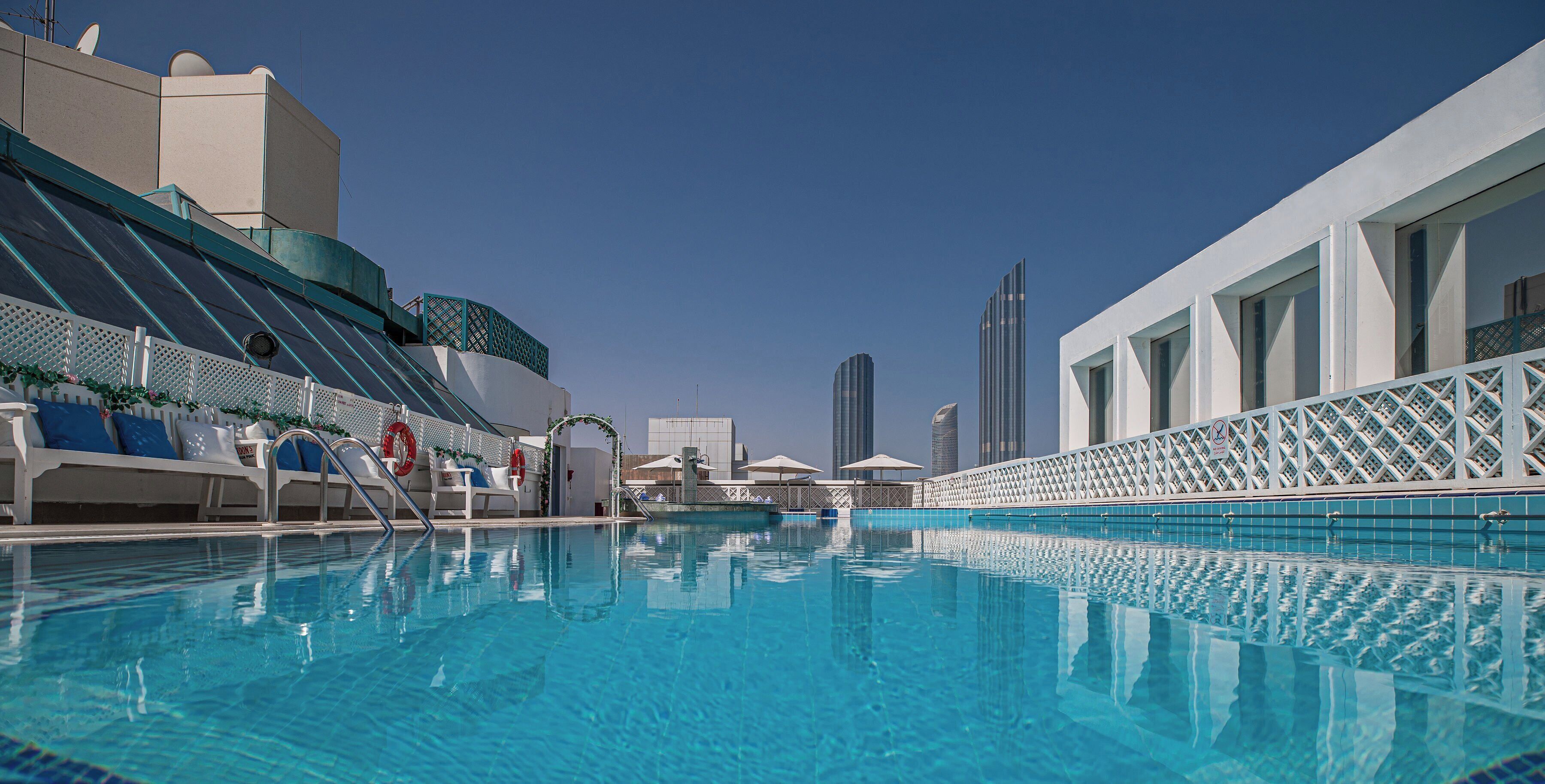 Outdoor pool, pool umbrellas, pool loungers