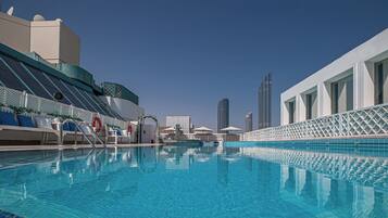 Outdoor pool, pool umbrellas, pool loungers