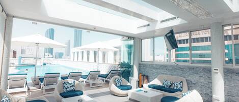 Outdoor pool, pool umbrellas, pool loungers