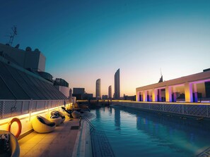 Outdoor pool, pool umbrellas, pool loungers
