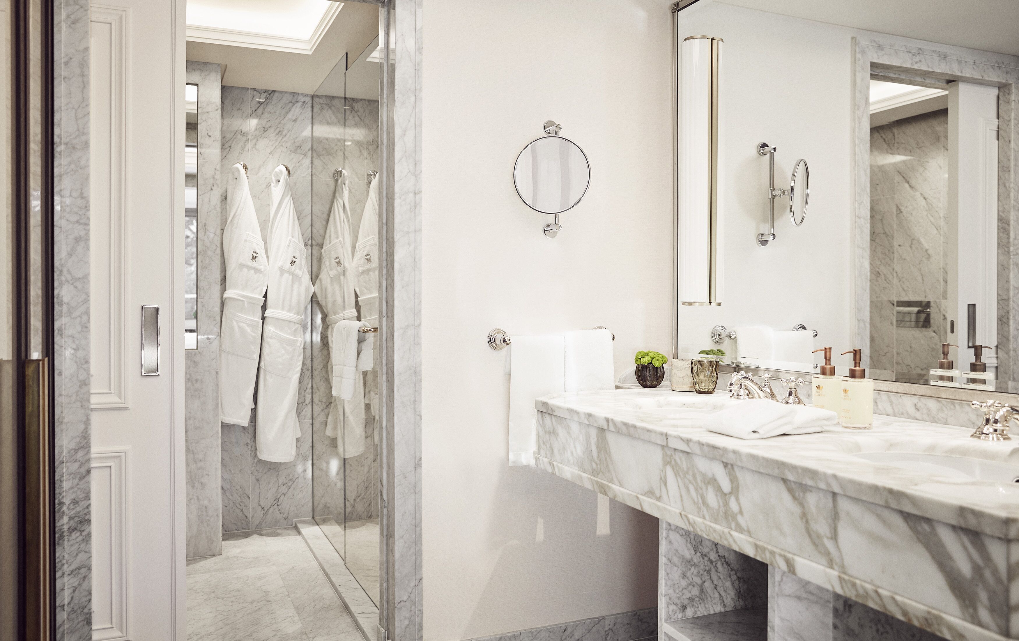 designer toiletries, hair dryer, bathrobes, slippers