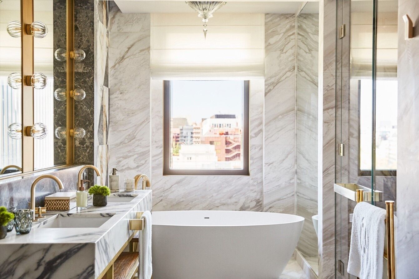 junior anglada suite | bathroom | designer toiletries, hair dryer, bathrobes, slippers