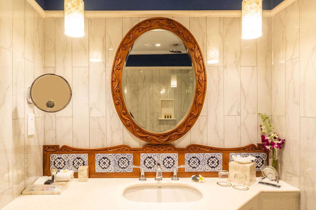 separate bathtub and shower, designer toiletries, hair dryer, bathrobes