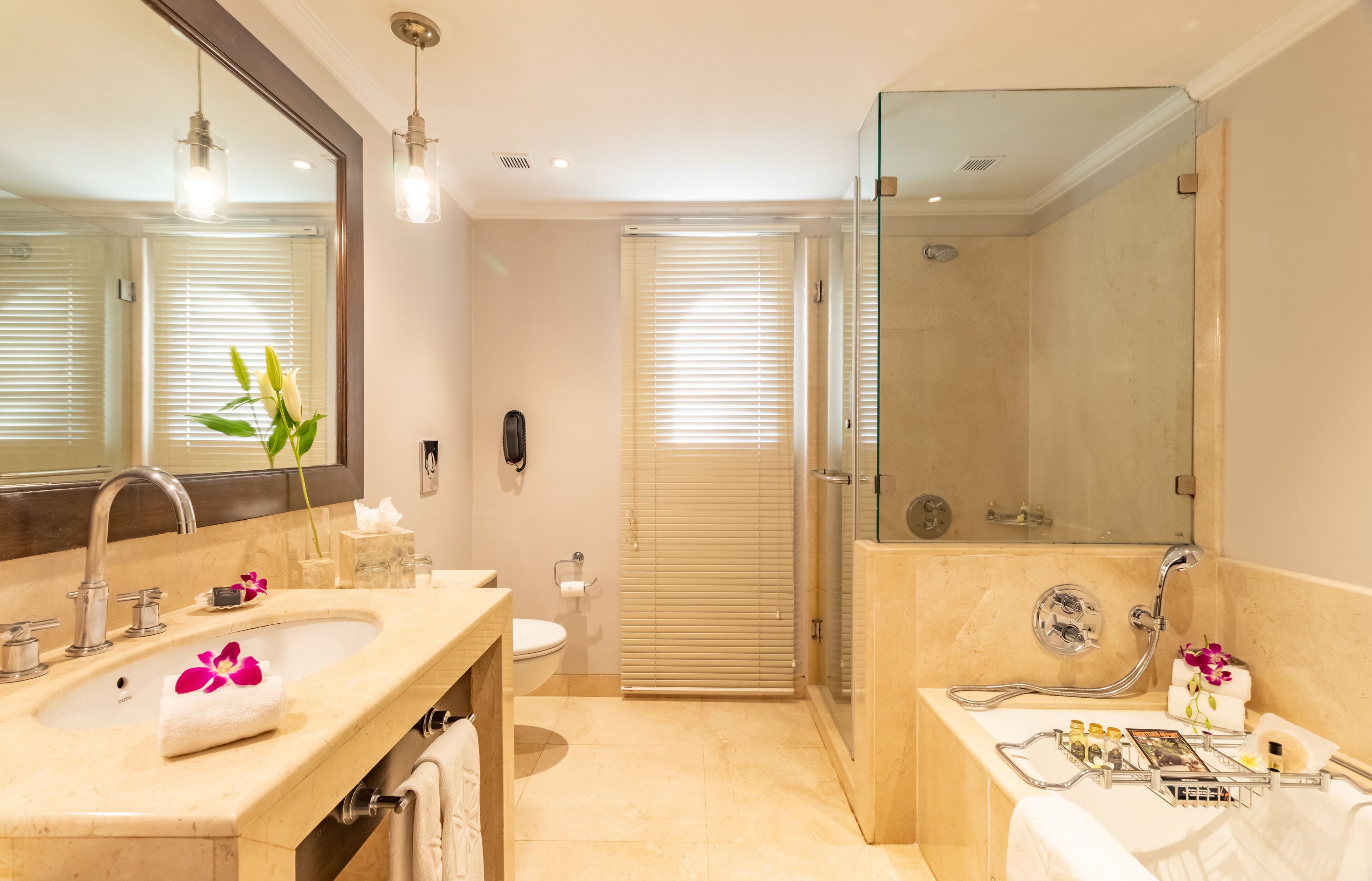 separate bathtub and shower, designer toiletries, hair dryer, bathrobes