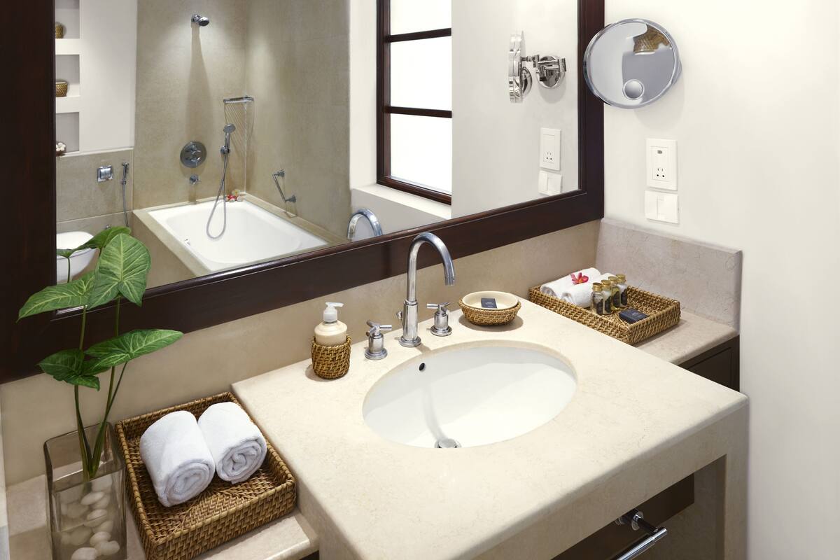 separate bathtub and shower, designer toiletries, hair dryer, bathrobes