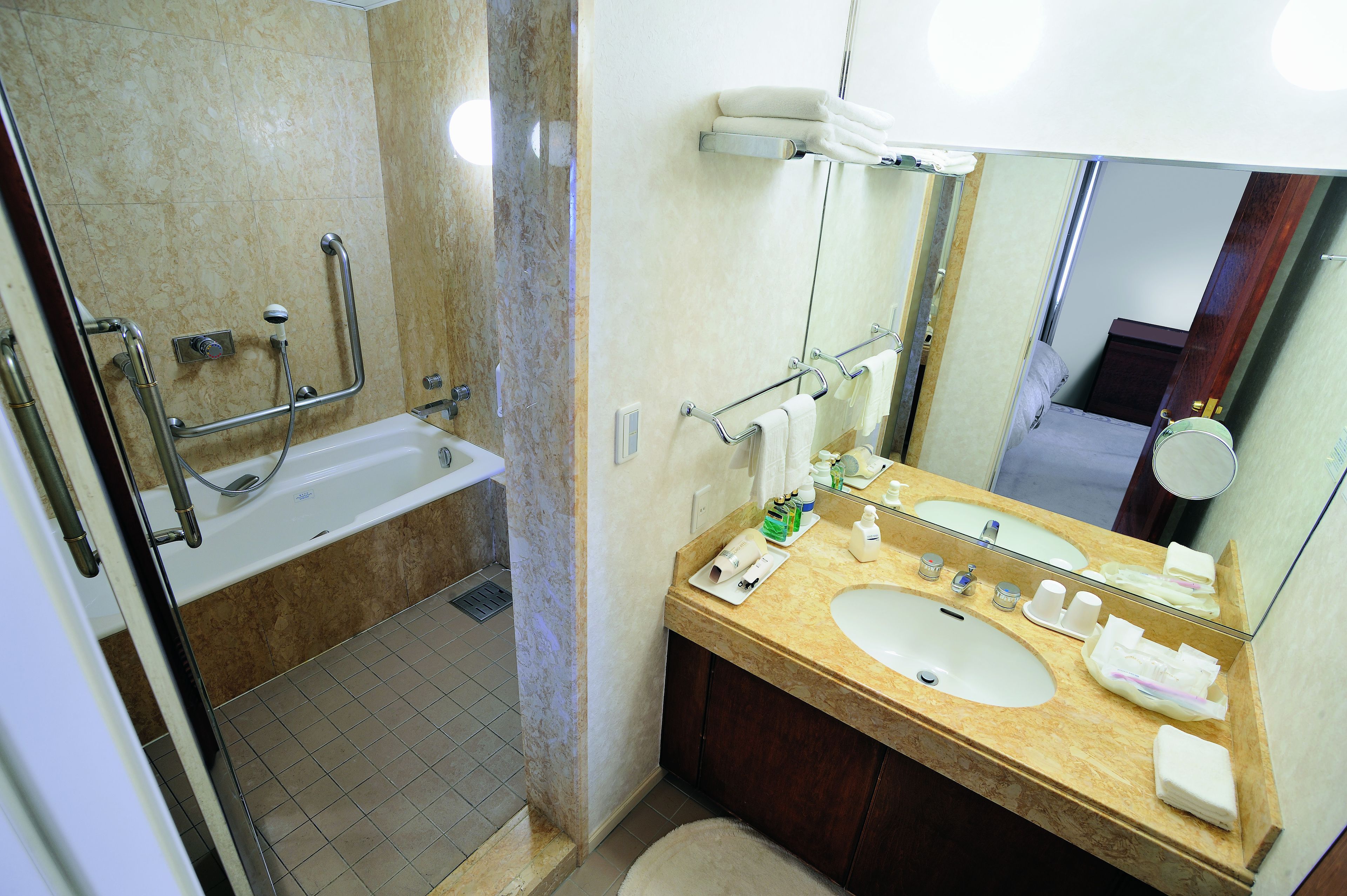suite room | bathroom | free toiletries, slippers, electronic bidet, towels