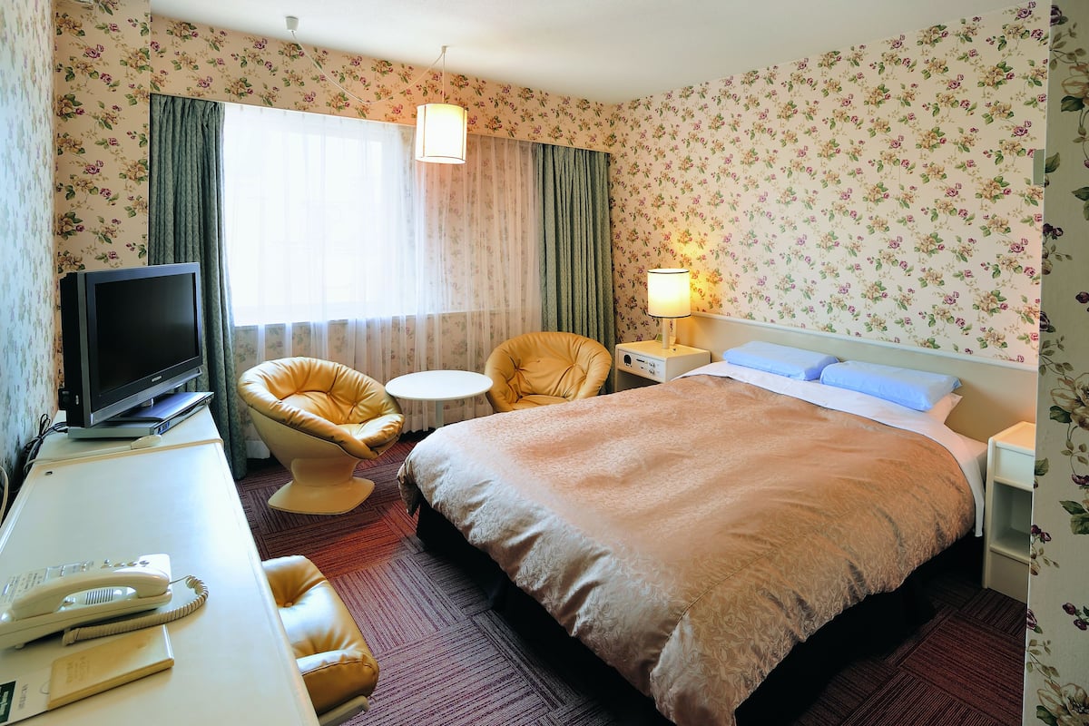 desk, blackout curtains, iron/ironing board, free wifi