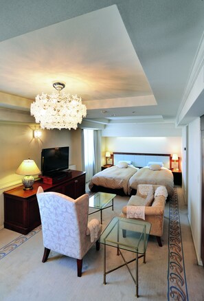 Suite Room | Desk, blackout curtains, iron/ironing board, free WiFi