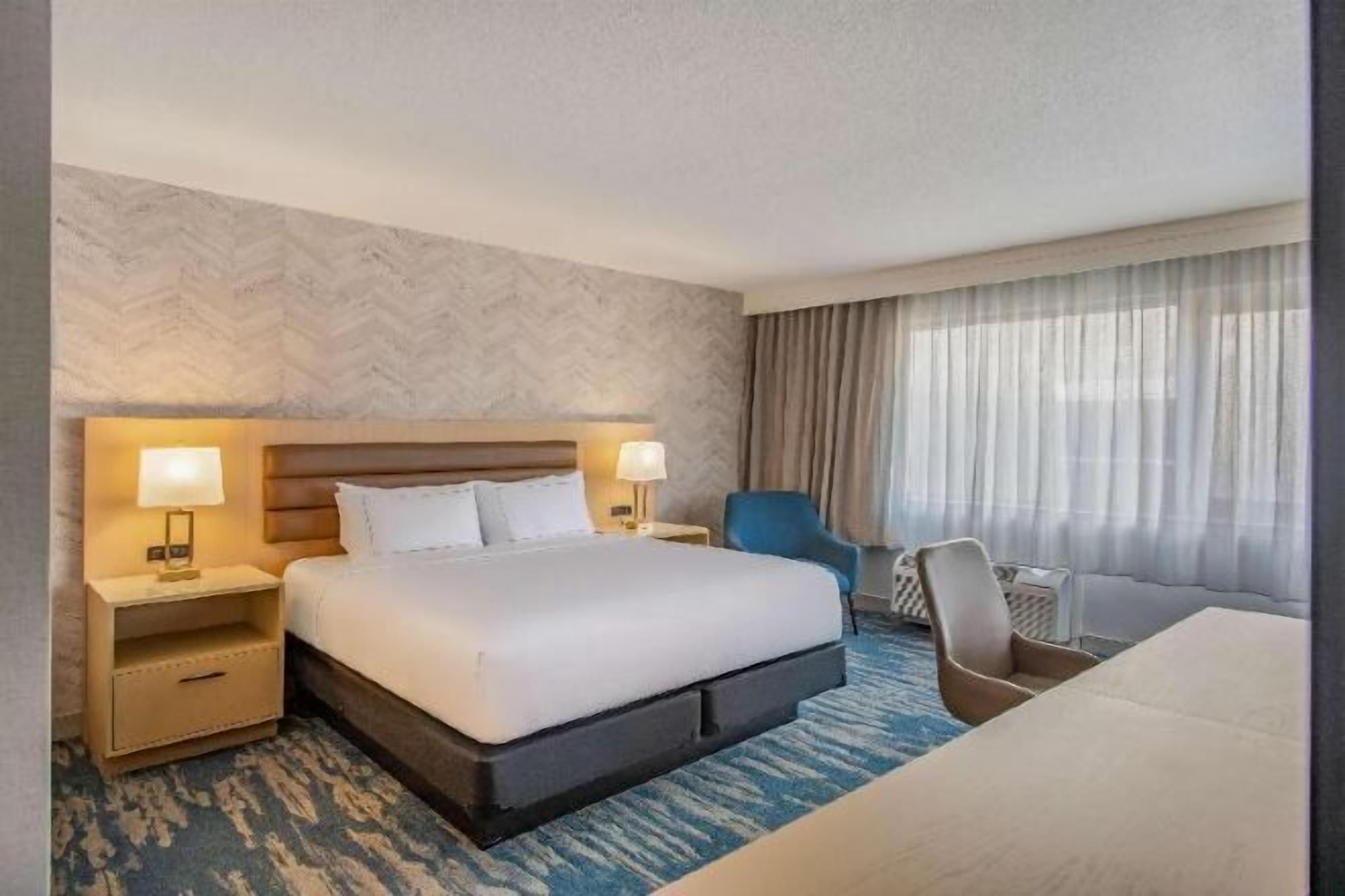 Premium bedding, down duvets, pillow-top beds, in-room safe