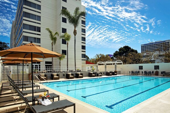 Outdoor pool, open 10:00 AM to 10:00 PM, pool umbrellas, sun loungers