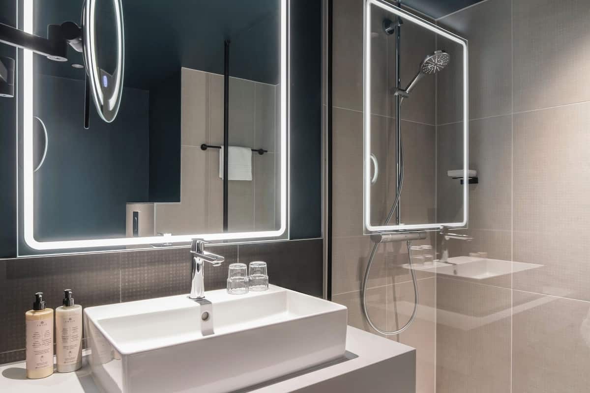 shower, eco-friendly toiletries, hair dryer, towels