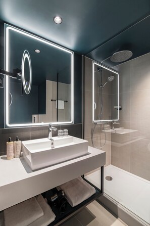 Shower, hydromassage showerhead, eco-friendly toiletries, hair dryer