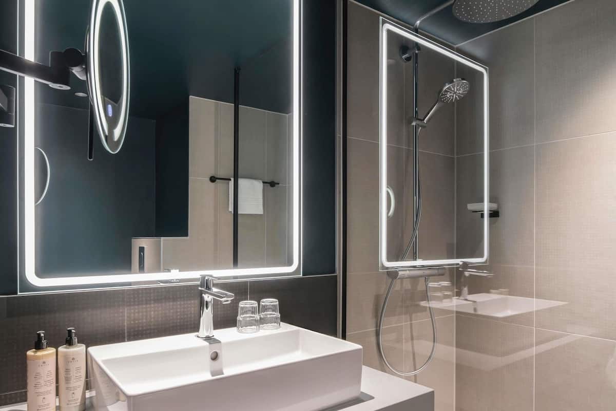 Shower, hydromassage showerhead, eco-friendly toiletries, hair dryer
